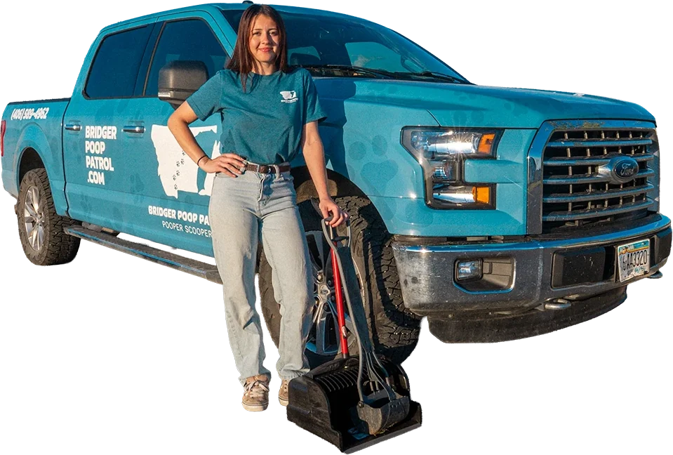 Angelina standing with her scooper in front of the teal Bridger Poop Patrol truck
