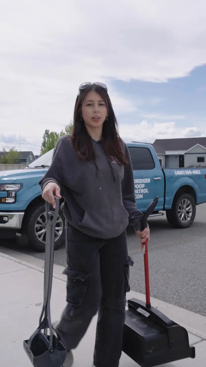 Angelina by the truck with her cleaning tools
